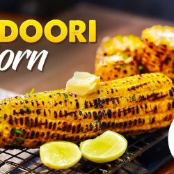 indian style bakes sweet corn with butter on top